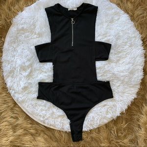 Black cut out bodysuit.